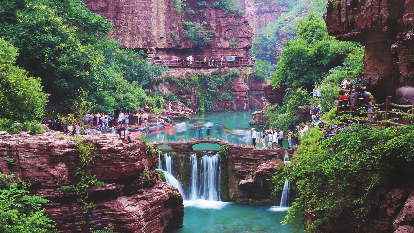 Red Stone Gorge waterfall and red-rock canyon scenery at Yuntai Mountain in Jiaozuo, Henan